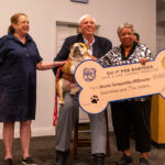 Wanda Coleman is presented with a novelty check